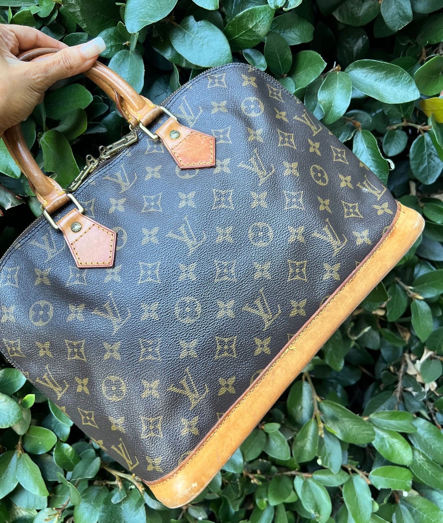 LOUIS VUITTON Alma Handbag