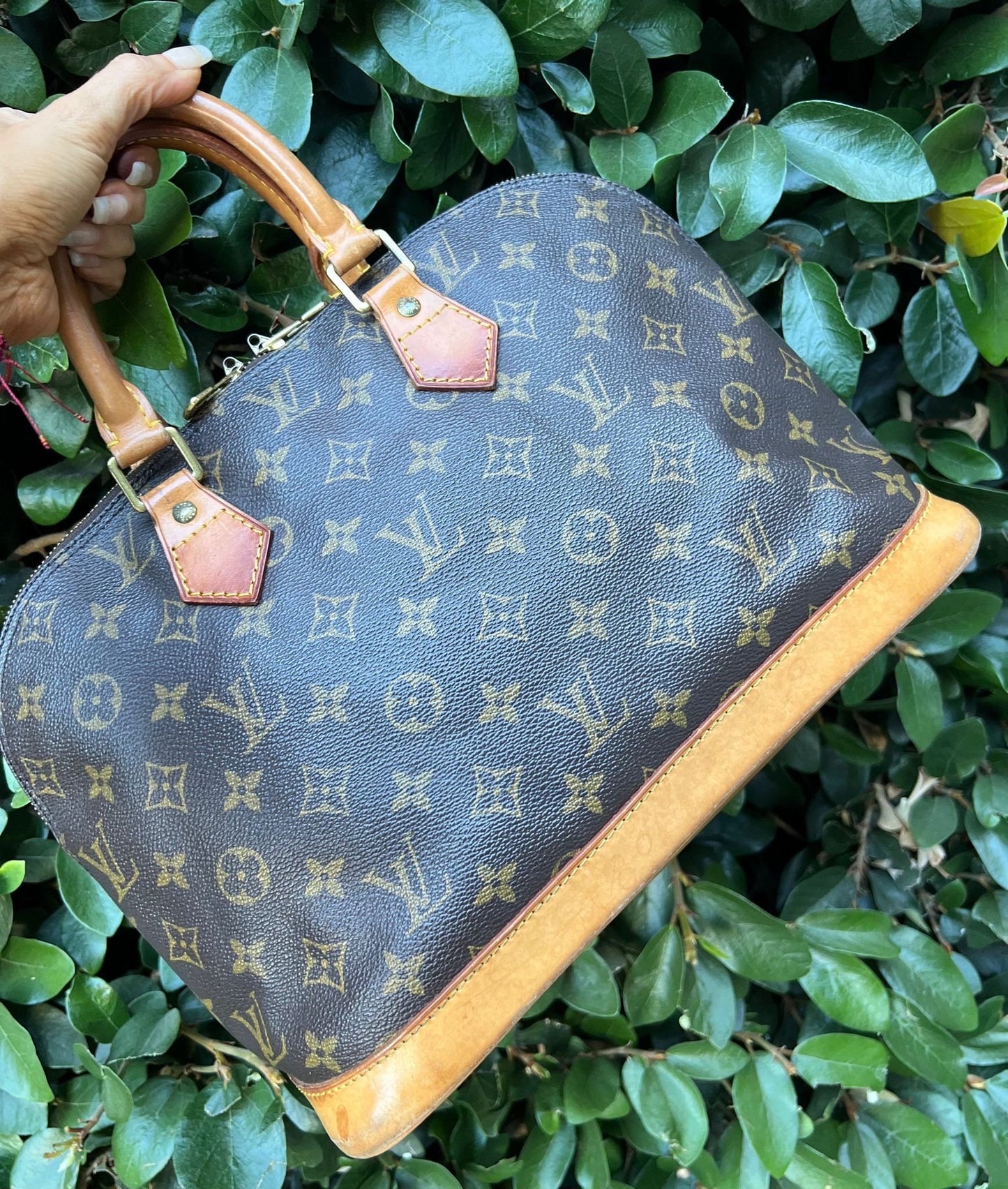 LOUIS VUITTON Alma Handbag
