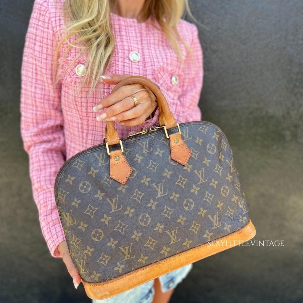 LOUIS VUITTON Alma Handbag