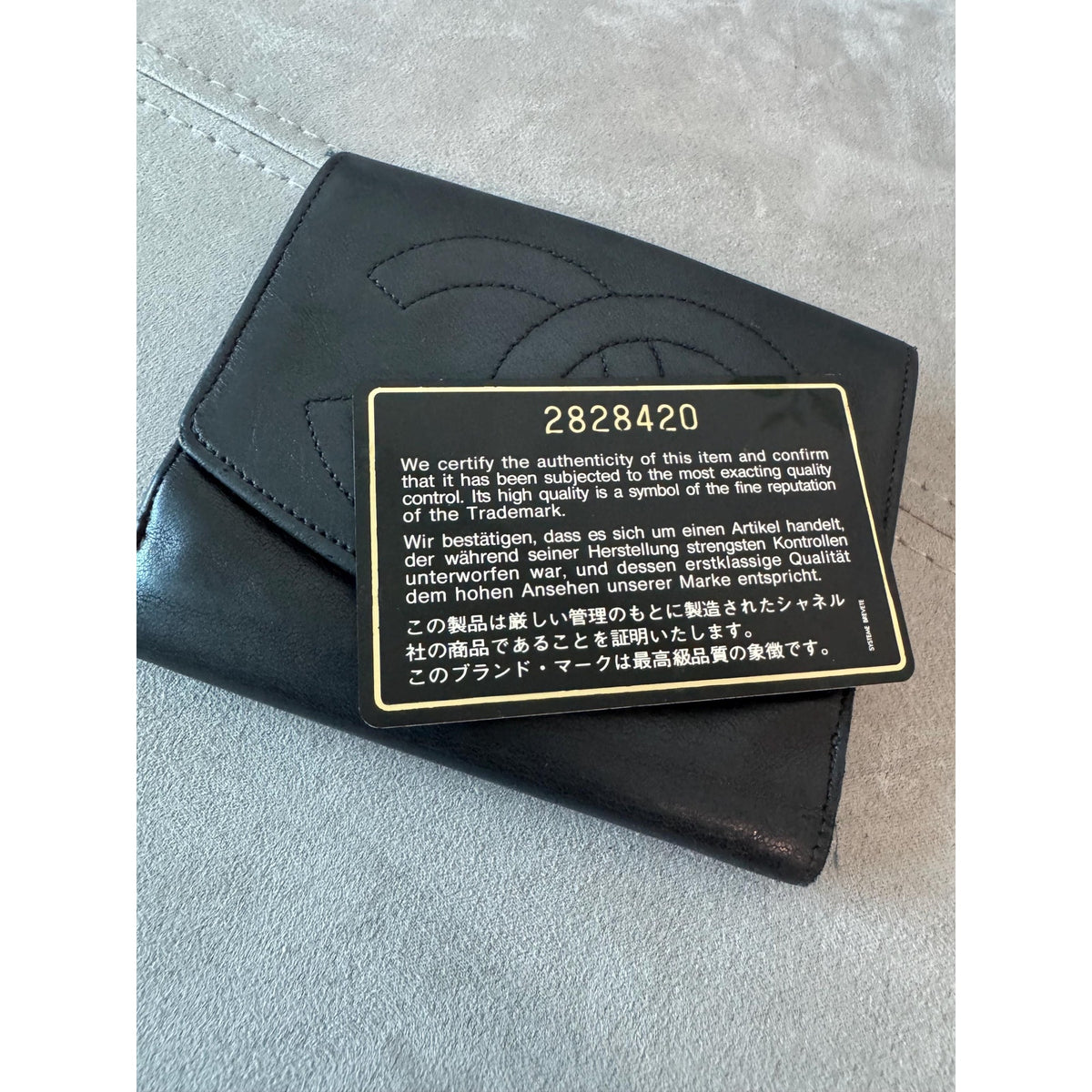 CHANEL Black Lambskin Bifold Wallet