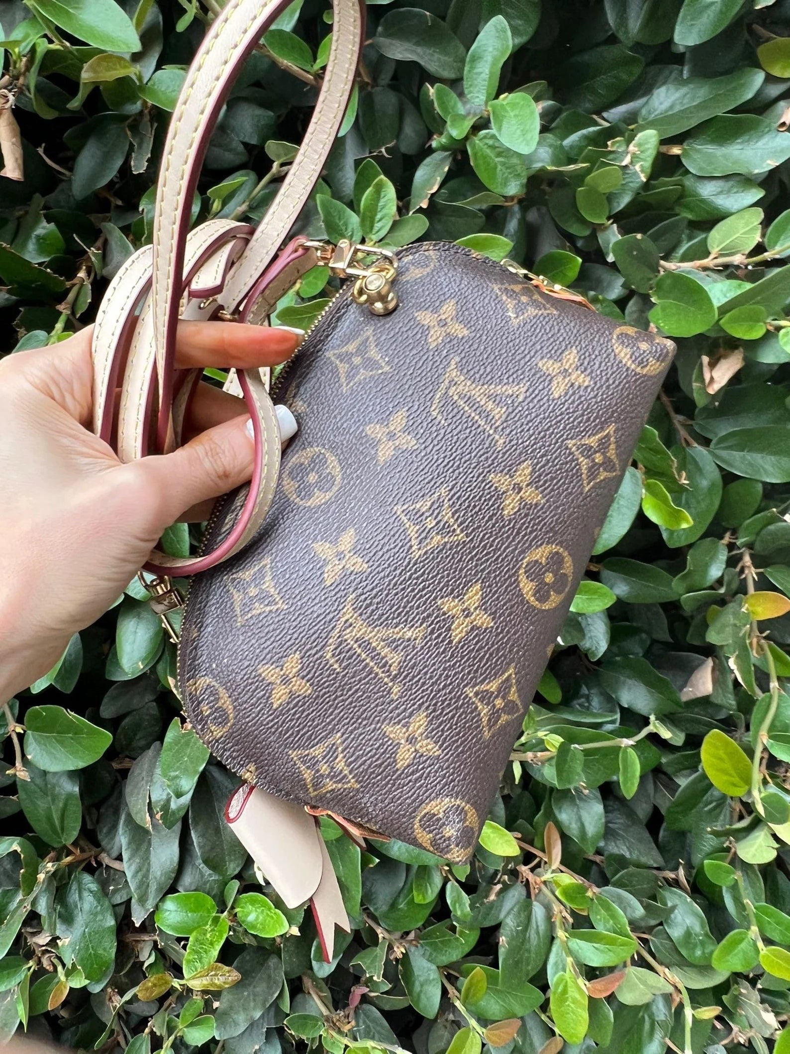 Shop Louis Vuitton Leather Logo Pouches & Cosmetic Bags by